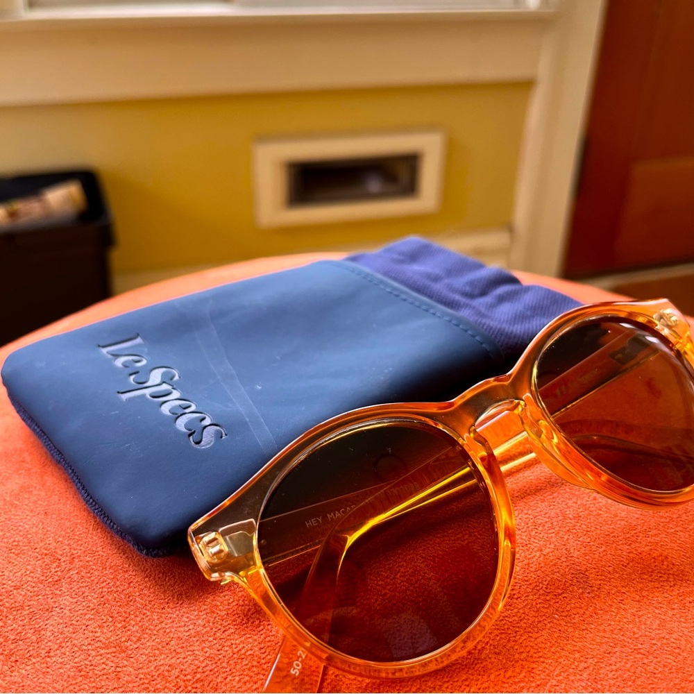 Polarized Le Specs sunglasses in translucent blonde.